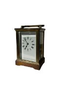 Early 20th century 8-day French carriage clock - with an anglaise case carrying handle and bevelled
