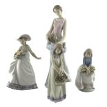 Large Lladro figure 'Someone to look up to' No.6771 and three smaller Lladro figures 'Carefree' No.5