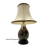 Moorcroft table lamp decorated in the 'Simeon' pattern by Philip Gibson