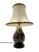 Moorcroft table lamp decorated in the 'Simeon' pattern by Philip Gibson