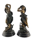 Pair of 19th century gilded spelter classically draped female figures with cherubs at their feet on