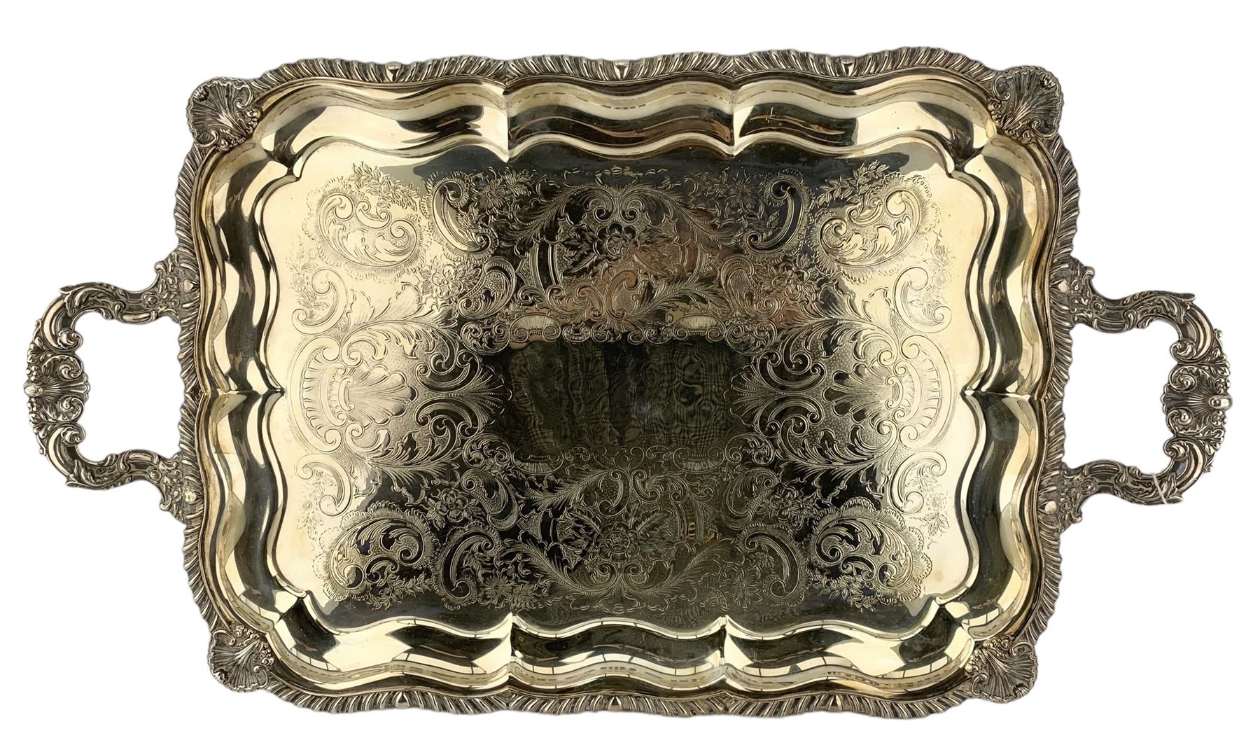 20th century two-handled silver-plated tea tray with floral engraved decoration and gadrooned shell