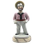 Staffordshire pottery standing figure of a sailor smoking a pipe