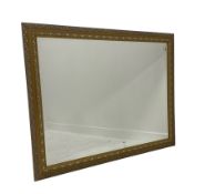 Gilt framed wall mirror