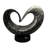 Large contemporary resin sculpture on ebonised circular base