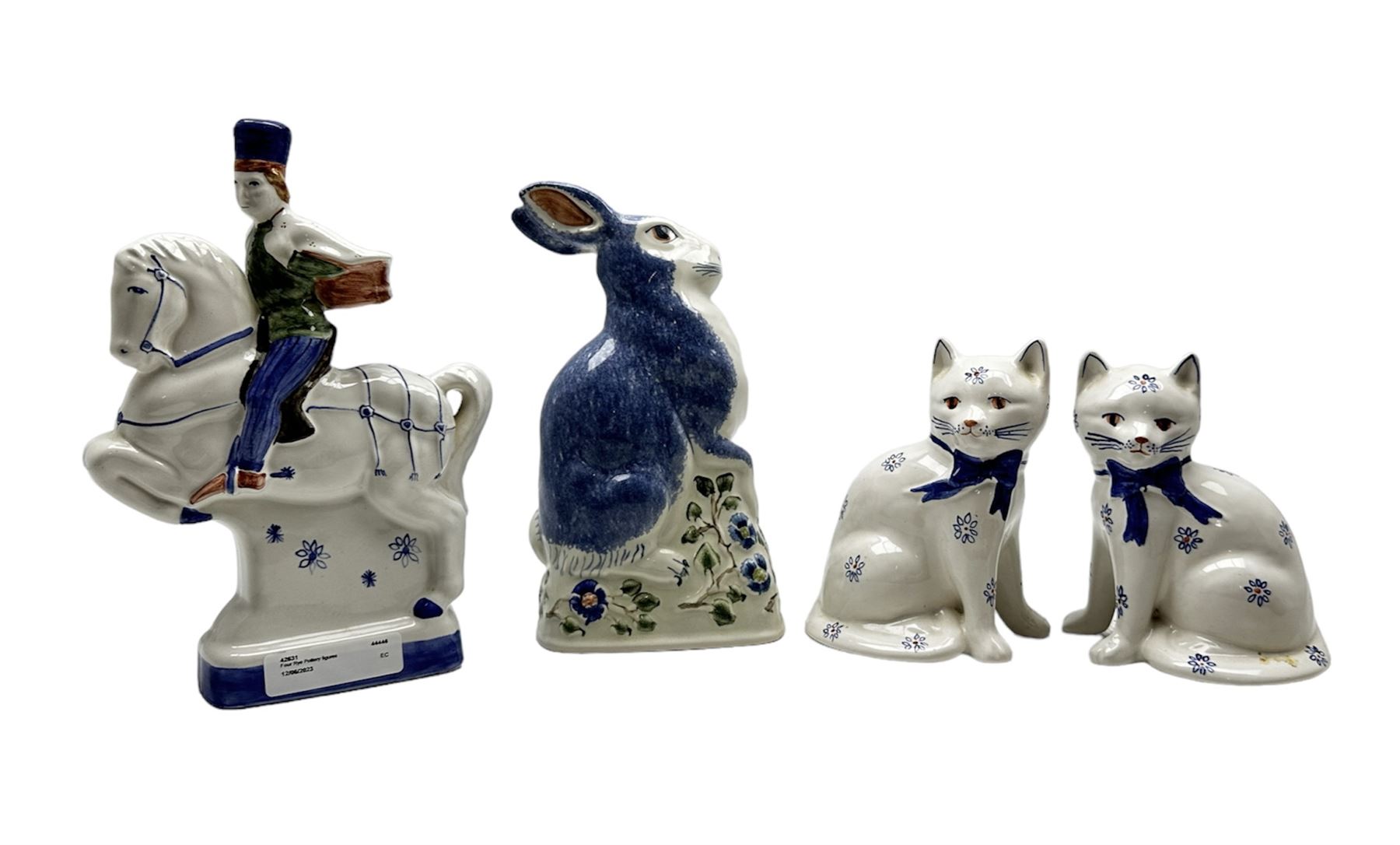 Four Rye Pottery figures to include a pair of Staffordshire style cats