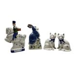 Four Rye Pottery figures to include a pair of Staffordshire style cats