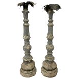 Pair of 20th century composite stone candle stands