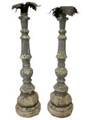 Pair of 20th century composite stone candle stands