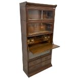 Gunn Furniture Co. - early 20th century oak barrister's or library sectional stacking bookcase