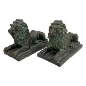 Pair bronze finish cast stone recumbent lions