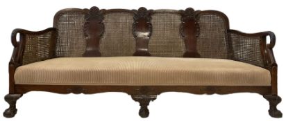 Early 20th century walnut bergere two seat sofa