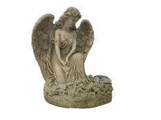 Composite stone garden ornament or memorial statue in the form of a Classically draped winged angel
