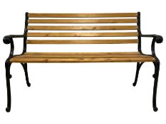 Black painted cast iron and wood slated garden bench