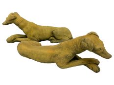 Pair cast stone recumbent whippets