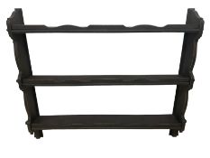 Black painted and wax finish three tier wall rack