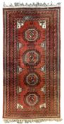 Antique Afghan Baluchi red ground rug