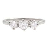 Platinum three stone round brilliant cut diamond ring