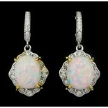 Pair of silver opal and cubic zirconia pendant stud earrings