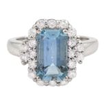 18ct white gold emerald cut aquamarine and round brilliant cut diamond cluster ring