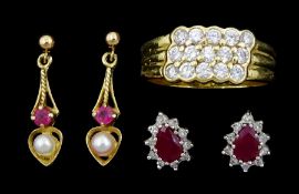 Pair of gold ruby diamond stud earrings