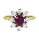 18ct gold oval cut ruby and round brilliant cut diamond cluster ring
