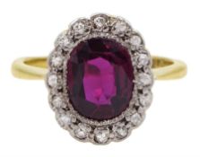 Early 20th century oval cut unheated Thai ruby and old cut diamond cluster ring
