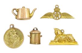 14ct gold Egyptian sphinx pendant / charm and four 9ct gold pendant / charms including kettle