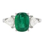 18ct white gold three stone cushion cut emerald and fancy trillion cut diamond ring