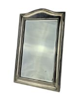 Edwardian silver upright dressing table mirror with plain arched frame on an easel stand 37cm x 23cm