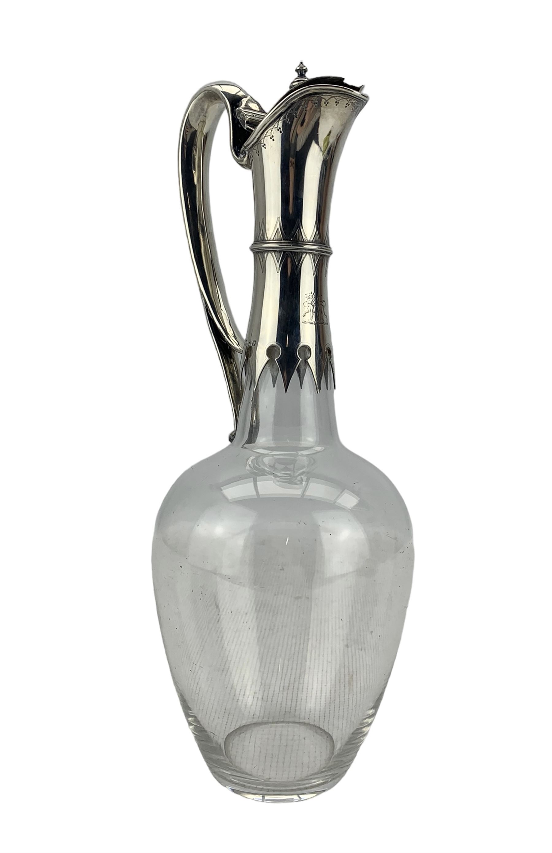 Victorian plain glass claret jug of ovoid form with silver mounts and loop handle H31cm Sheffield 18