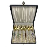 Set of six Danish sterling silver gilt coffee spoons each with a different coloured enamelled stem