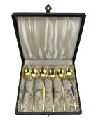 Set of six Danish sterling silver gilt coffee spoons each with a different coloured enamelled stem