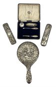 Silver backed hand mirror embossed with angel heads Chester 1907