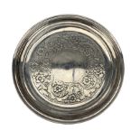 Early 19th century silver circular teapot stand with engraved floral decoration on a wooden base D1