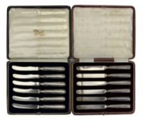 Two early 20th century cased sets of silver handled knives