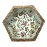 19th century Canton hexagonal stand or shallow dish decorated with birds and flowers within a gilt a