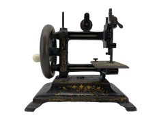19th century French hand crank sewing machine with gilt decoration