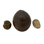 Coconut shell carved with a 19th century three masted sailing ship