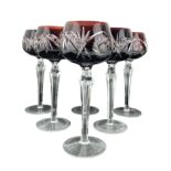 Set of six Bohemian cut hock glasses with ruby coloured bowls on chamfered stems H19cm