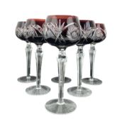 Set of six Bohemian cut hock glasses with ruby coloured bowls on chamfered stems H19cm