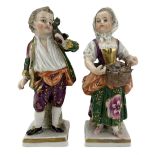 Pair of 19th century Samson of Paris male and female rustic figures on square bases with gold anchor