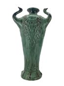 Large Art Nouveau style three handled green glazed vase