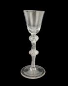 18th century cordial glass with round funnel bowl and double knop air twist stem H18cm