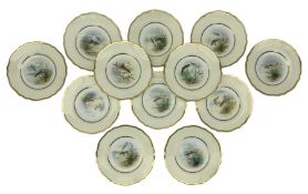 Set of twelve Wedgwood shaped porcelain plates