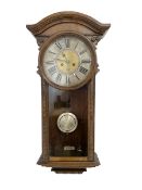 German - early 20th century 8-day wall clock in a mahogany case