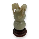 18th century Celadon Jade double gourd carved to the top with a coiled guei dragon