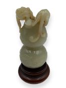 18th century Celadon Jade double gourd carved to the top with a coiled guei dragon