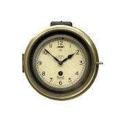 English - Mercer "Octo" early 20th century brass cased bulkhead clock with a painted 7" dial within