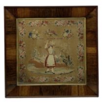 Victorian Berlin woolwork picture depicting a young woman collecting flowers in a landscape